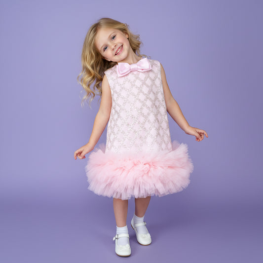 Roze meisjesfeestjurk met glinsterende pailletten, satijnen strik en zachte tule lagen