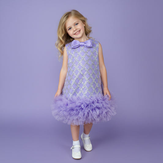 Lila meisjesfeestjurk met glinsterende pailletten, satijnen strik en zachte tule lagen