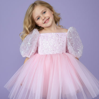 Roze meisjesfeestjurk met pofmouwen, satijnen strik en tule rok